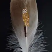 Barn owl painted on an owl feather image 1