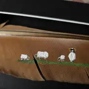 Flock of sheep painted on a peacock feather image 2