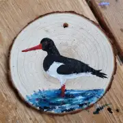 Oyster catcher on wood slice image 1