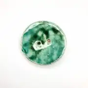 Ceramic button image 1