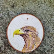 Sea eagle on wood slice image 1