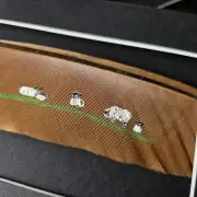 Flock of sheep painted on a peacock feather image 4