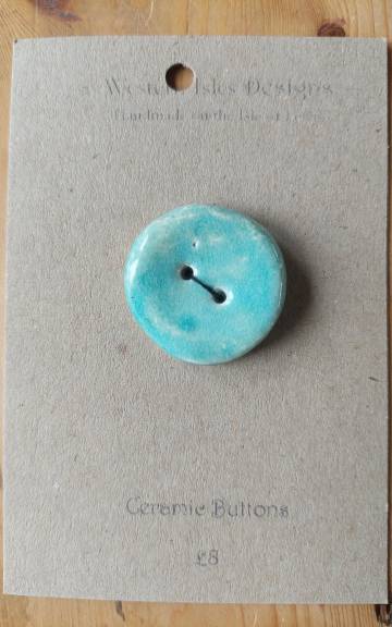 Ceramic button
