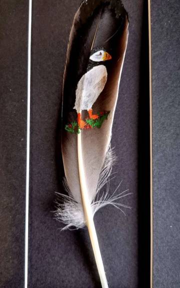 Puffin painted on a goose feather