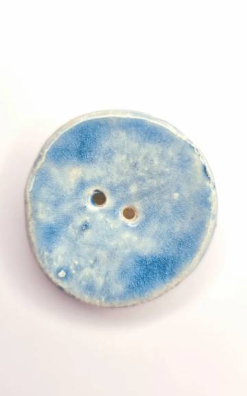 Ceramic button