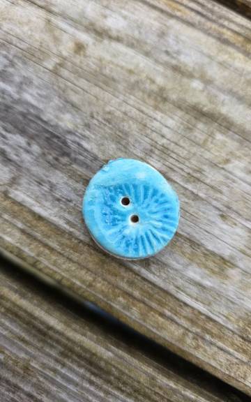 Ceramic button
