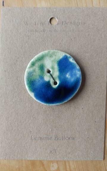 Ceramic button