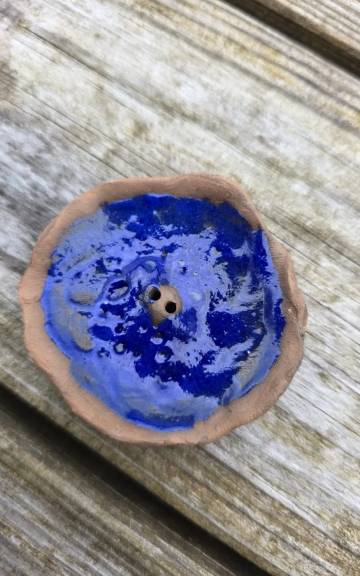 Ceramic button