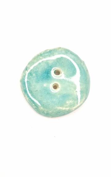 Ceramic button