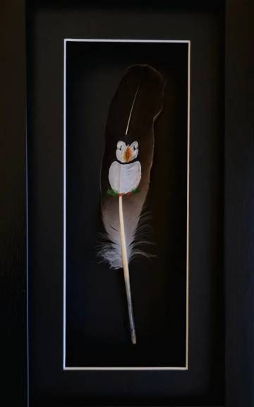 Puffin painted on a goose feather