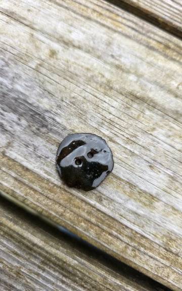 Ceramic button