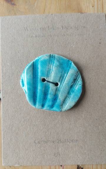 Ceramic button