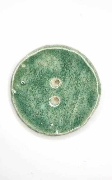 Ceramic button