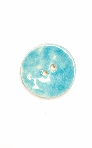 Ceramic button