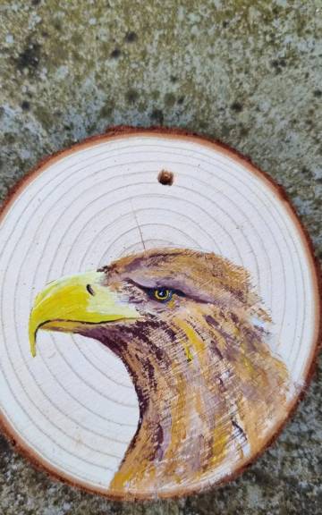 Sea eagle on wood slice