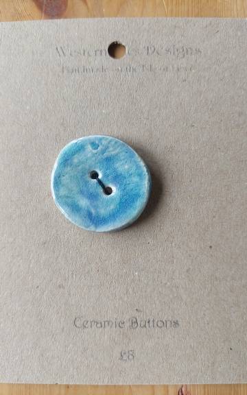 Ceramic button