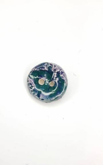 Ceramic button