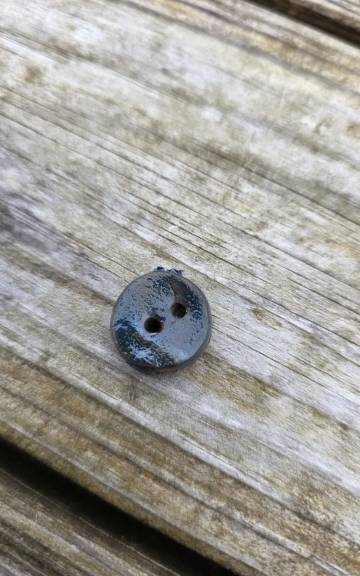 Ceramic button