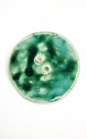 Ceramic button