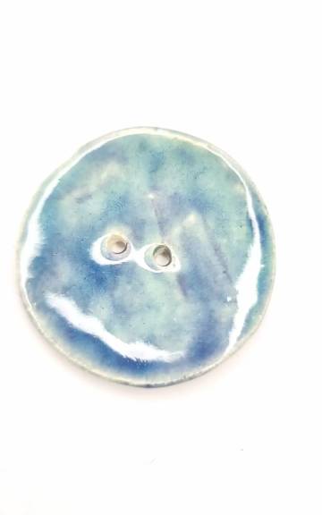 Ceramic button