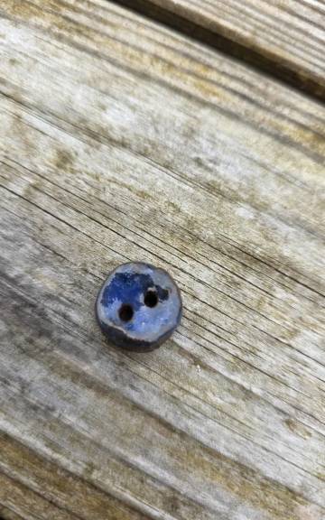 Ceramic button