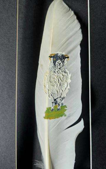 Sheep painted on a goose feather
