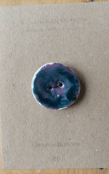 Ceramic button