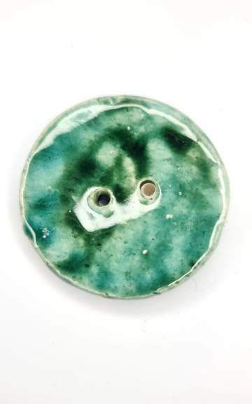 Ceramic button