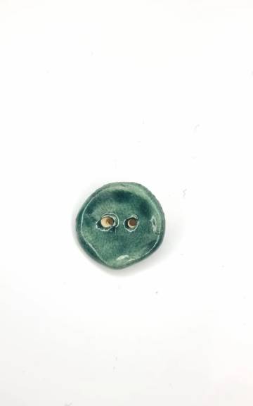 Ceramic button
