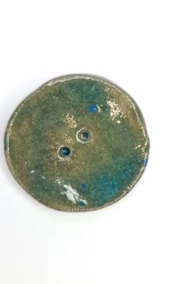 Ceramic button