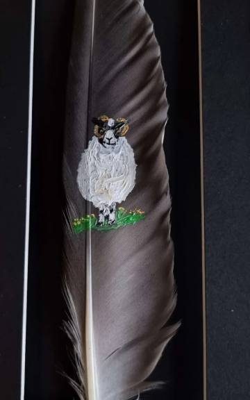 Scottish blackface sheep painted on a goose feather