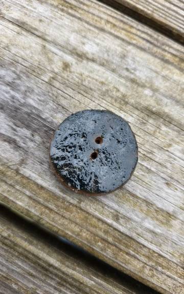 Ceramic button