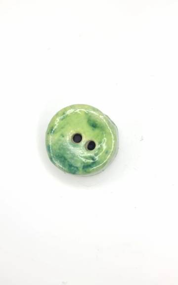 Ceramic button