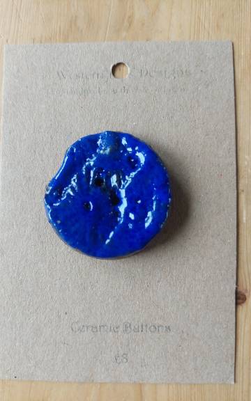 Ceramic button