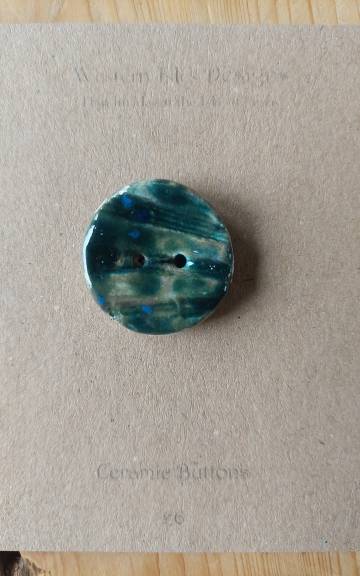 Ceramic button