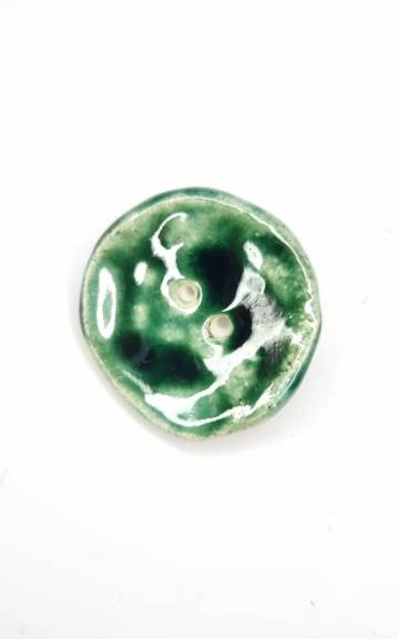 Ceramic button