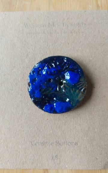 Ceramic button