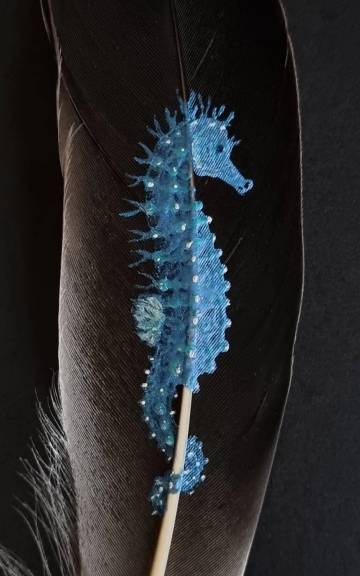 Seahorse painted on a goose feather
