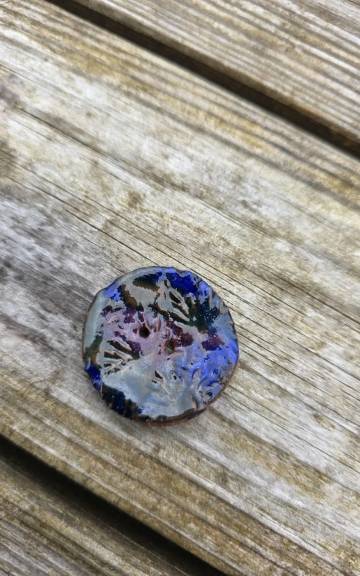 Ceramic button