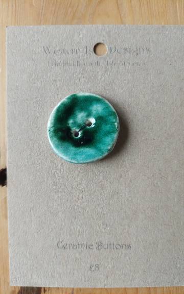Ceramic button