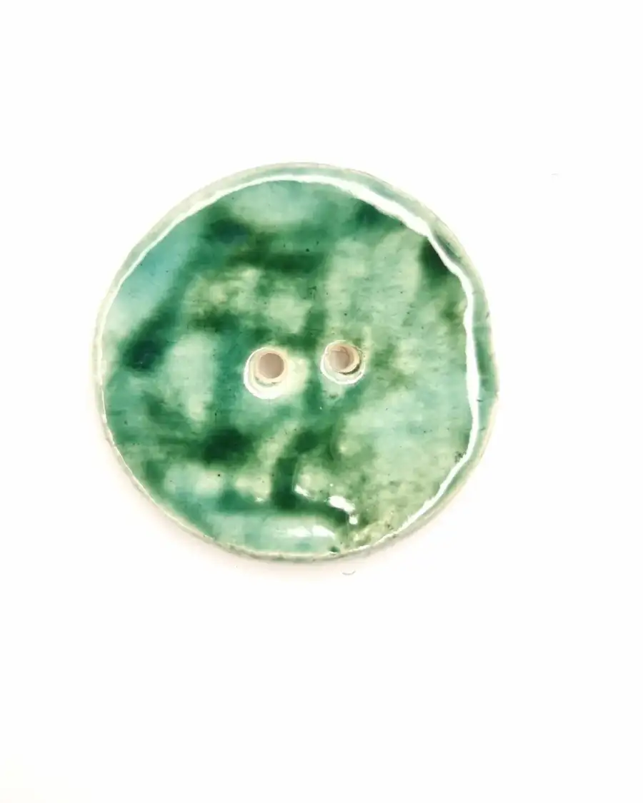 Ceramic button