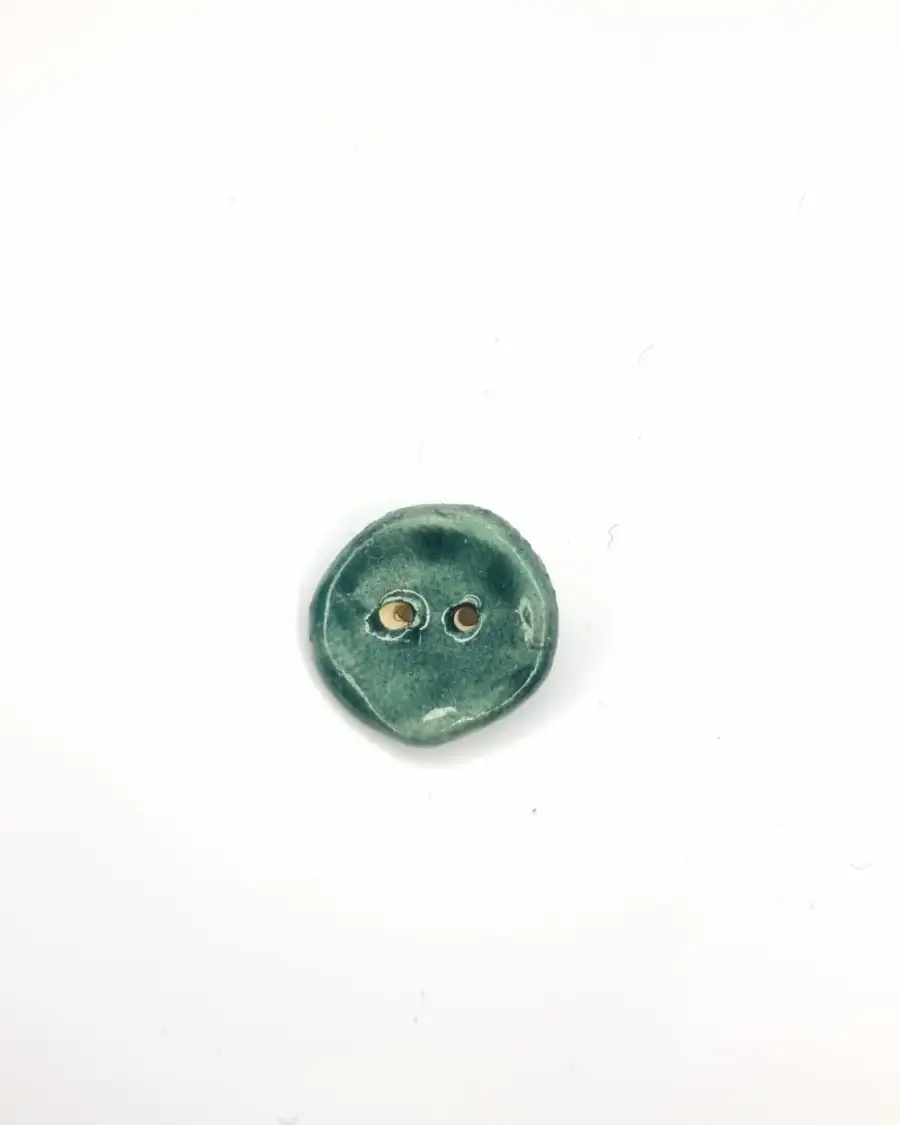 Ceramic button