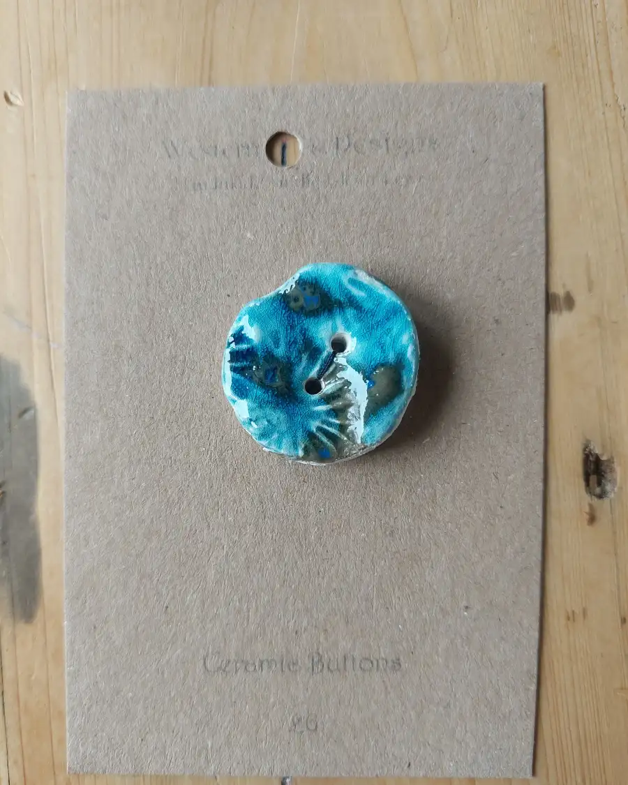 Ceramic button