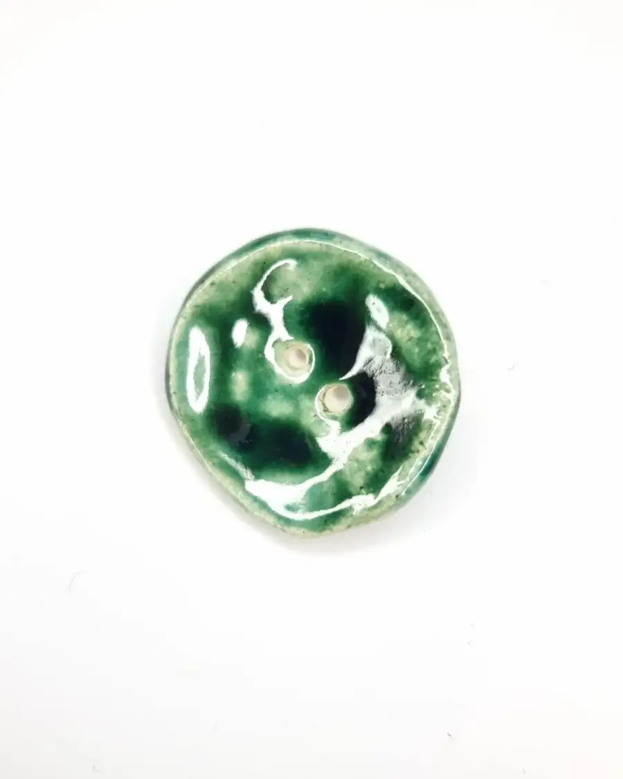 Ceramic button