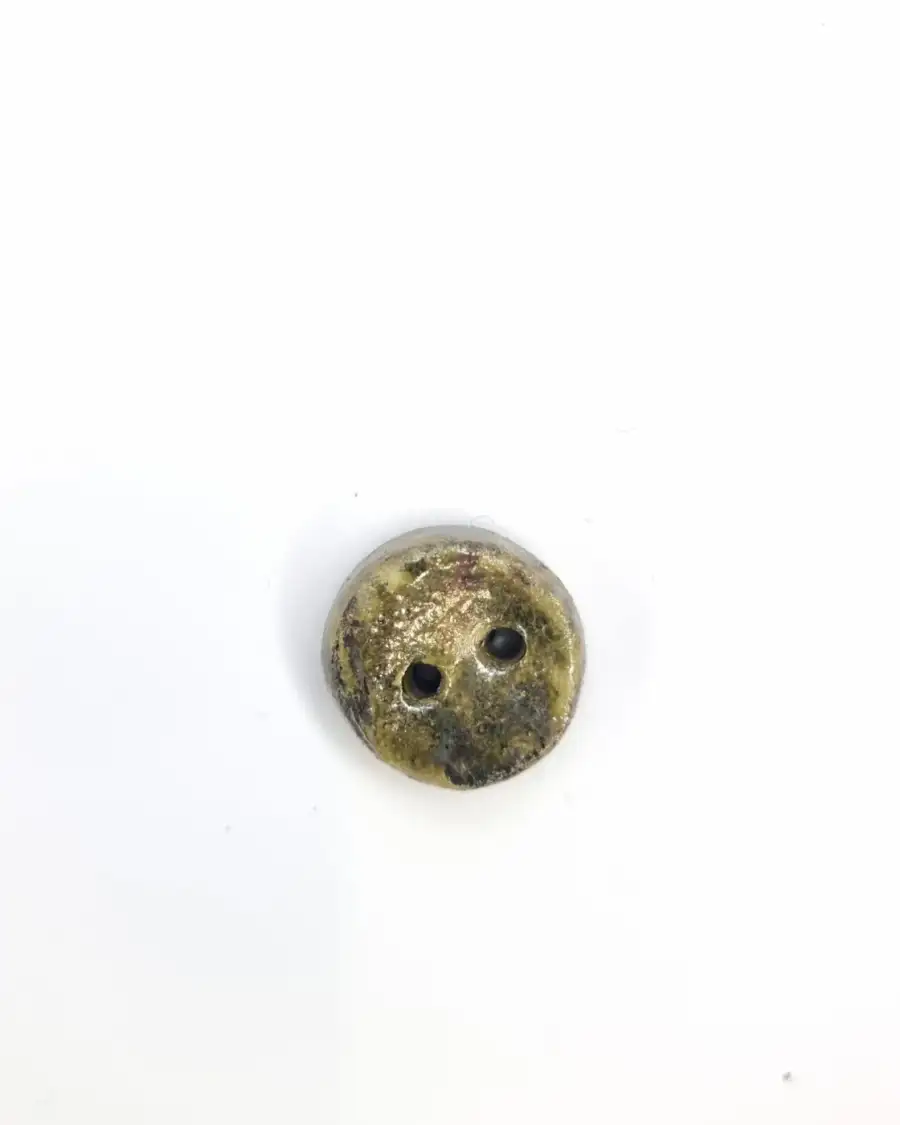 Ceramic button