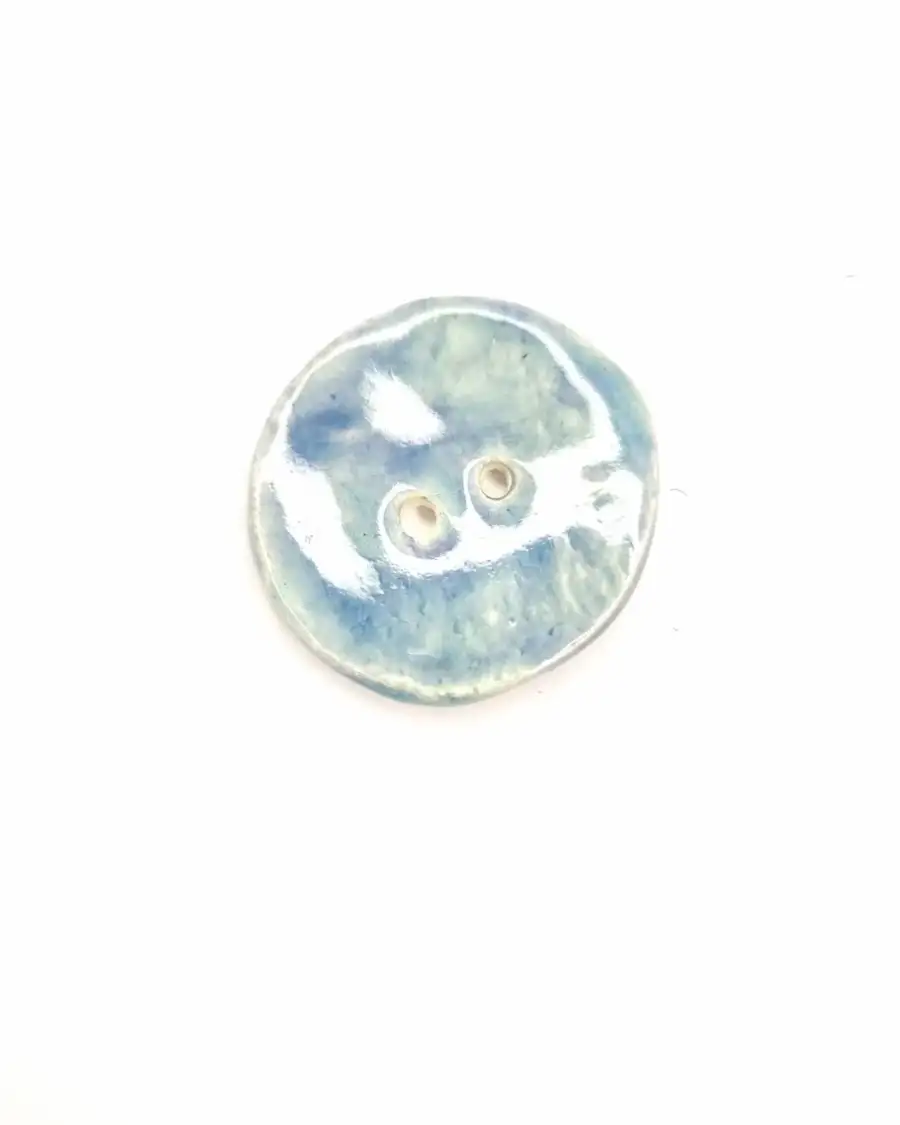 Ceramic button