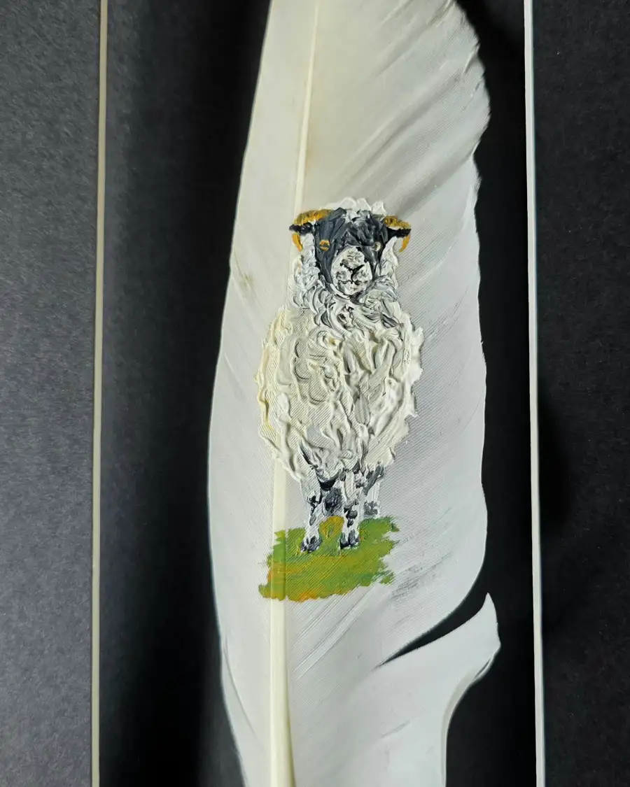 Sheep painted on a goose feather