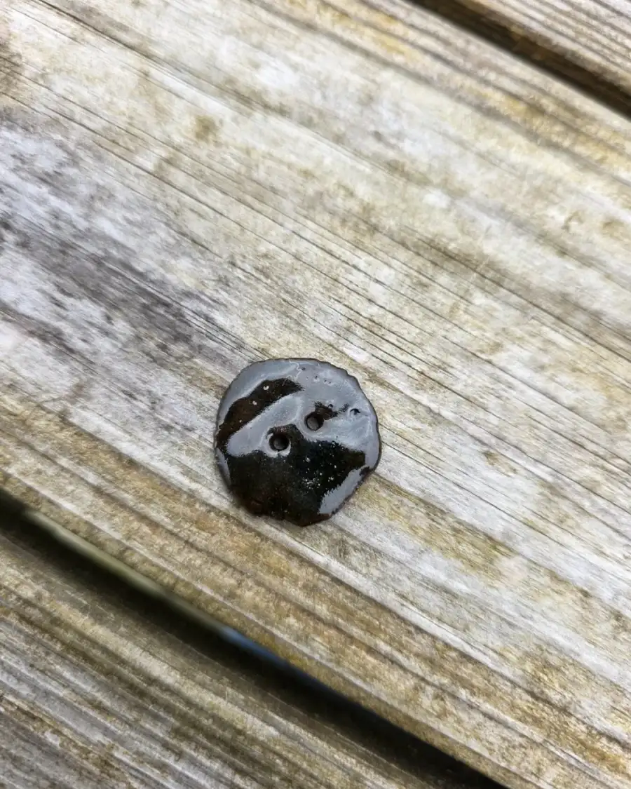Ceramic button