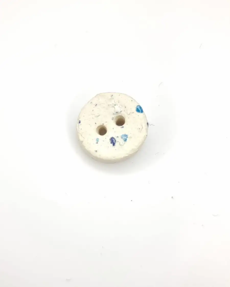 Ceramic button