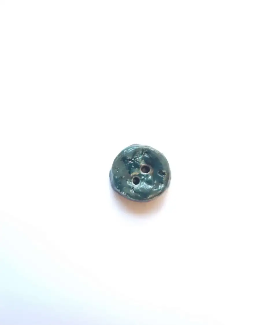 Ceramic button